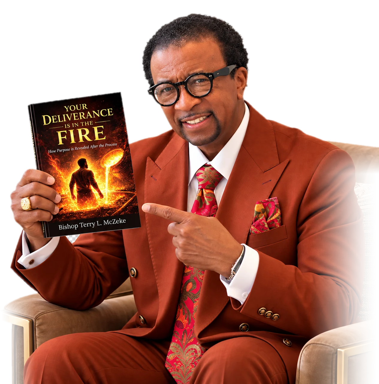 Apostle Terry L. McZeke holding up and pointing to his book, Your Deliverance Is in the Fire